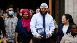 Adnan Syed leaves a courthouse surrounded by supporters