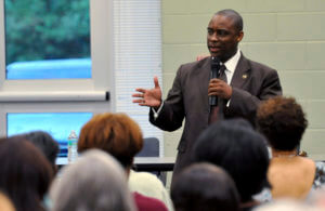 Clayton County Sheriff Victor Hill speaks at a candidate forum in Rex, Ga