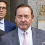 Actor Kevin Spacey, center, leaves court, Monday, Oct. 17, 2022