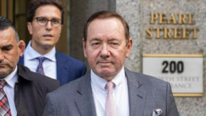 Actor Kevin Spacey, center, leaves court, Monday, Oct. 17, 2022