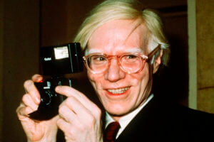 Andy Warhol 1976 with camera