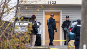 officers outside a house