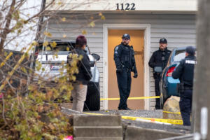 Officers investigate a homicide