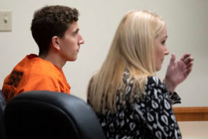 Bryan Kohberger, left, with his attorney, public defender Anne Taylor, right, 