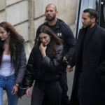 Andrew Tate and his brother Tristan are brought by police officers to the Court of Appeal, in Bucharest, Romania