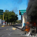 A truck burns on a street in Culiacan