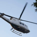 A government helicopter takes off from the prosecutor's building where Ovidio Guzmán is in custody