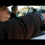 Bryan Kohberger, left, and his father are seen talking to a sheriff's deputy during a traffic stop on Thursday, Dec. 15