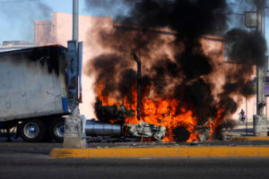 A truck burns on a street in Culiacan