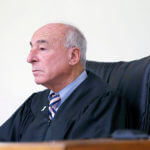 Judge Mark S. Coven hears the case in Quincy District court, Monday, Jan. 9, 2023.