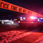 Police tape surrounds the crime scene in Enoch, Utah