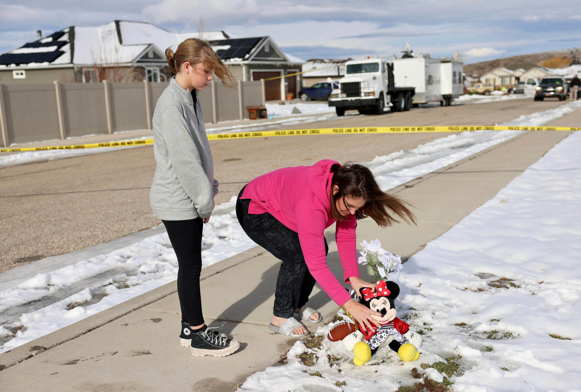 Scene outside near a home where eight members of a family were killed in Enoch, Utah