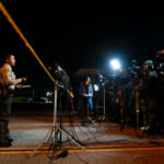 Members of the media wait for a briefing in Monterey Park