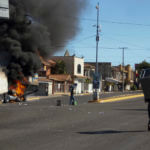 A truck burns on a street in Culiacan