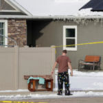 Scene outside near a home where eight members of a family were killed in Enoch, Utah