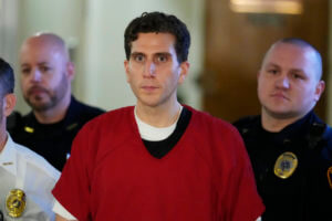 Bryan Kohberger, who is accused of killing four University of Idaho students, is escorted to an extradition hearing