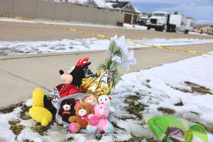 Scene outside near a home where eight members of a family were killed in Enoch, Utah