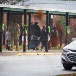 Parents escort their children Richneck Elementary School on Monday Jan. 30