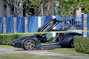 An empty vehicle appears on a street where rapper XXXTentacion was shot on Monday, June 18, 2018