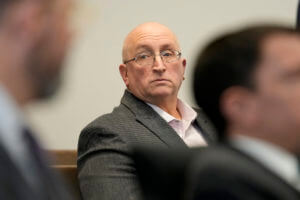 Robert E. Crimo Jr., father of Robert Crimo III, waits for court to begin before Judge George D. Strickland