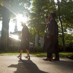 Graduates walk at a Harvard Commencement ceremony held for the classes of 2020 and 2021,