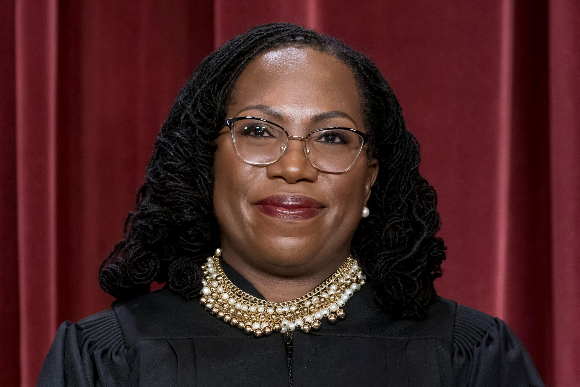 Justice Ketanji Brown Jackson poses for the Supreme Court group portrait.