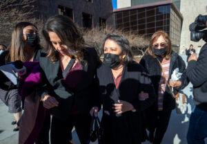 Relatives of victims of the August 2019 Walmart mass shooting, who declined to speak to the media, leave the federal court in El Paso