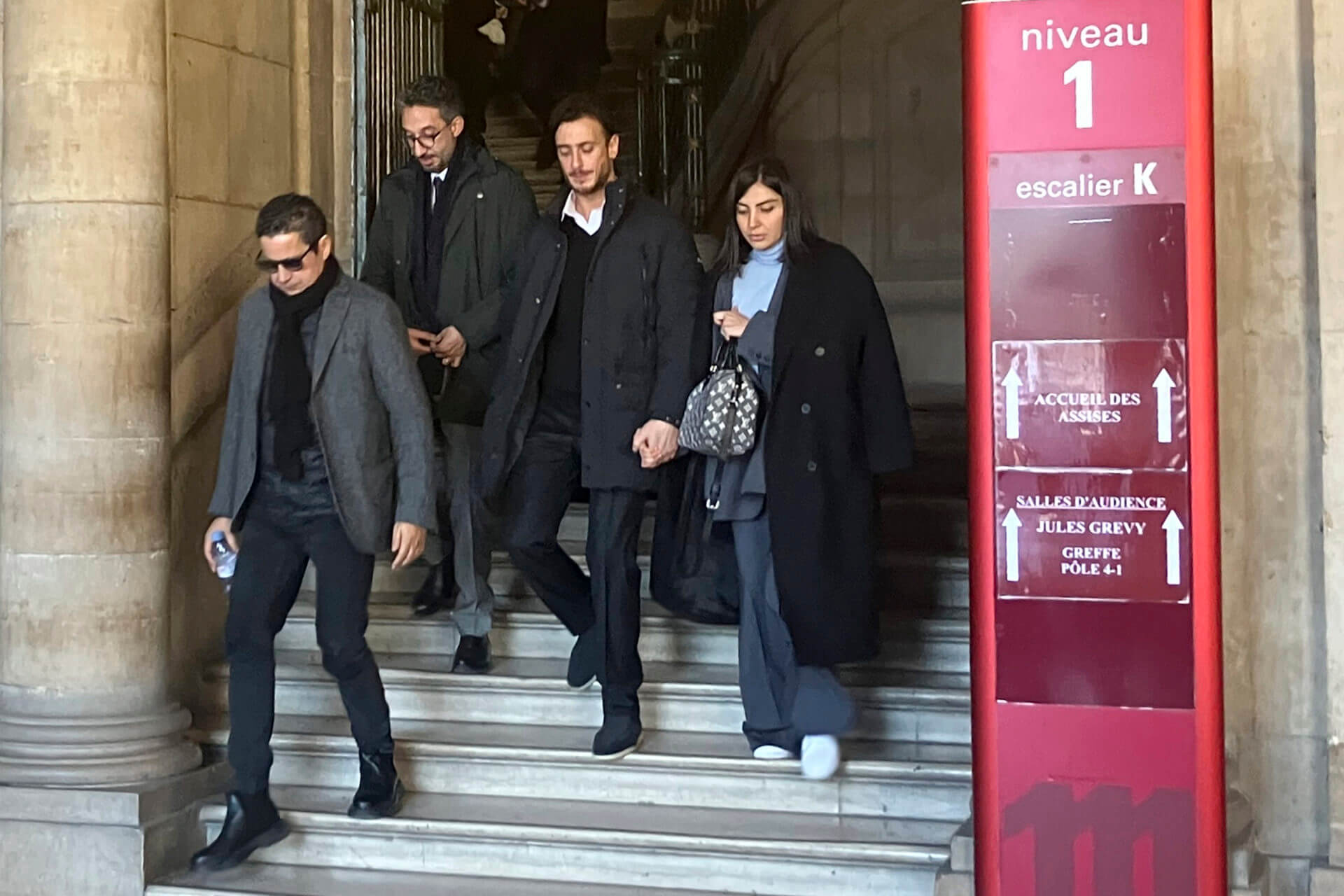 Moroccan singer Saad Lamjarred, second right, leaves the court house