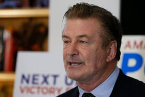 Actor Alec Baldwin, speaks to supporters of Amanda Pohl, candidate for Virginia Senate District 11 in her home in Midlothian, Va., Tuesday, Oct. 22, 2019.