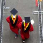 New graduates walk into the High Point Solutions Stadium before the start of the Rutgers University graduation ceremony