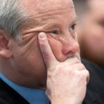 Prosecutor Creighton Waters listens to defense attorney Dick Harpootlian.