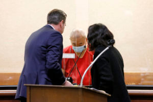 Chunli Zhao, center, appears for a plea hearing with his defense attorney Eric Hove