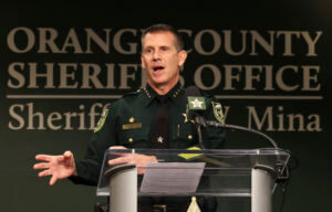 Orange County Sheriff John Mina addresses the media during a press conference about multiple shooting