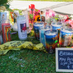 Candles and messages are left near Bishop David O'Connell's residence