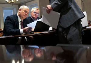 Defense attorney Jim Griffin, left, looks over evidence alongside Alex Murdaugh