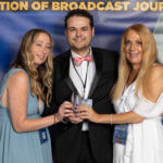 TV journalist Dylan Lyons, 24, poses for a photo with his girlfriend, left, and mom