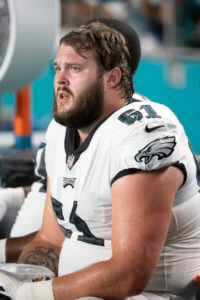 Philadelphia Eagles guard Josh Sills (61) sits on the sidelines