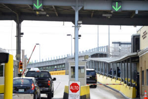 Motorists pay a bridge toll at Gateway International Bridge