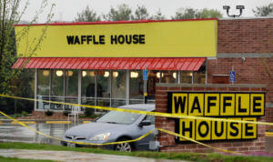 Police tape blocks off a Waffle House restaurant on April 22, 2018, in Nashville