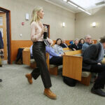 Gwyneth Paltrow enters the courtroom.