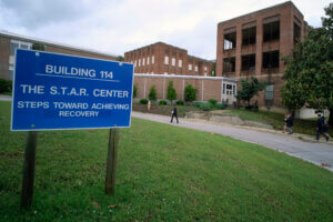 Visitors walk toward Building 114, the S.T.A.R. Center