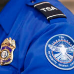 FILE - Transportation Security Administration officer at Dallas Love Field Airport.