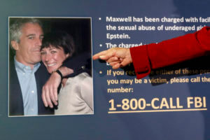 FBI sign features photo of (L to R): Jeffrey Epstein, Ghislaine Maxwell.