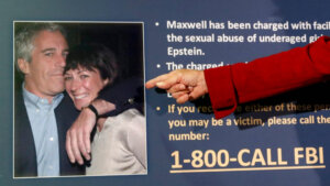 FBI sign features photo of (L to R): Jeffrey Epstein, Ghislaine Maxwell.