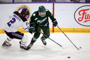 Holy Cross's Jack Robilotti (2) defends Mercyhurst's Carson Briere (6) during the first half of an NCAA hockey game on Friday, Nov. 12, 2021