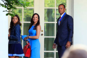 Tiger Woods, right, with his daughter Sam Alexis Woods, left, and his girlfriend Erica Herman, center,