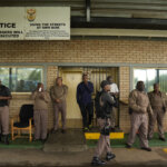 Prison staff at the entrance to the Atteridgeville Prison