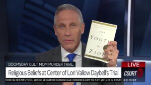 Vinnie Politan holds up Chad Daybell's book.