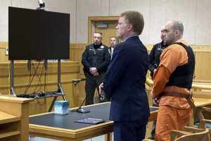 Joseph Eaton appears in court with his attorney