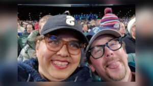 Photo of Leticia Martinez-Cosman and Brett Gitchel taken at seattle mariners game